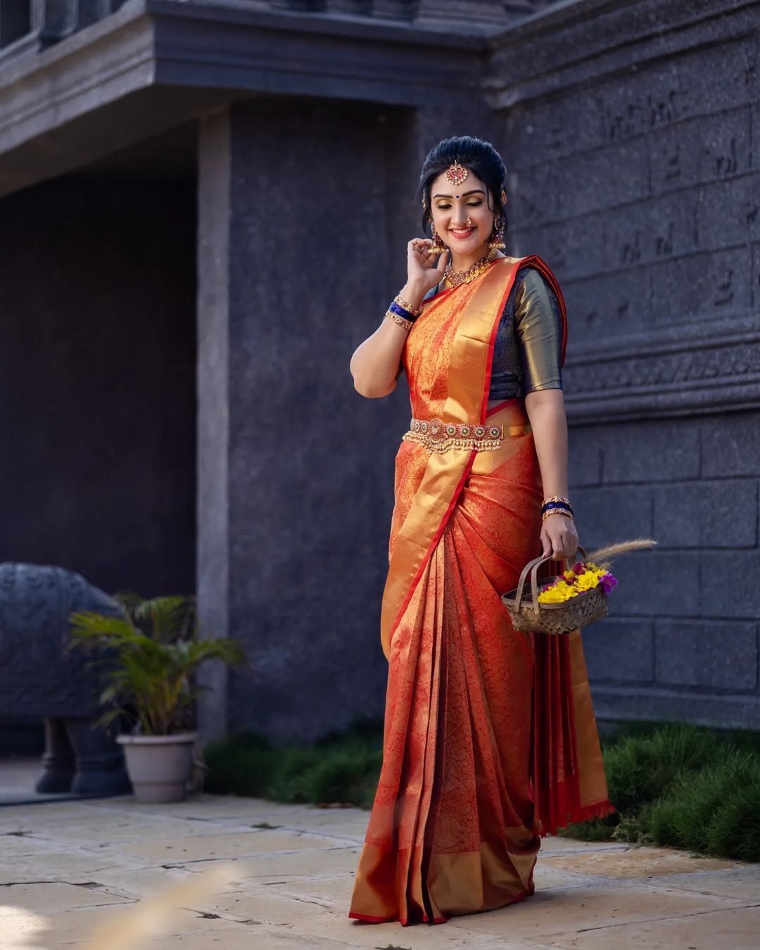 Telugu TV Actress Sridevi Vijaykumar Images in Orange Saree Blue Blouse 4